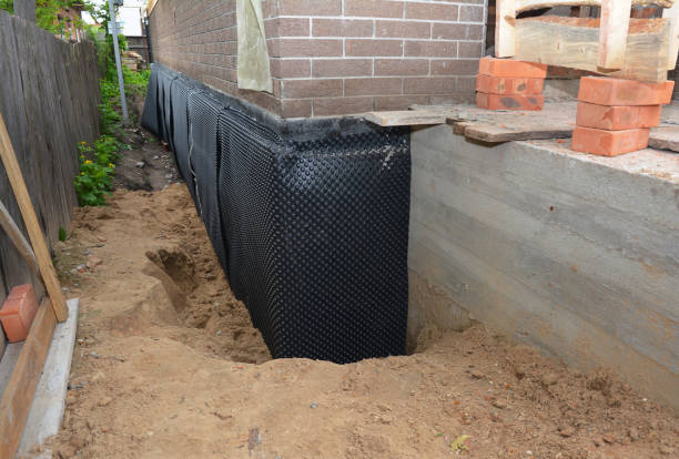 Happy homeowners after waterproofing job in Farragut